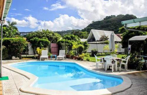 Punaauia Apartment | TAHITI - Sanny's Place Family Room & Poo