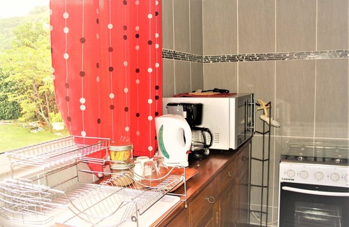 Punaauia Apartment | TAHITI - Sanny's Place Room & Pool