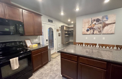 Webster House | Tails Up Retreat! Modern home minutes from world class hunting and fishing