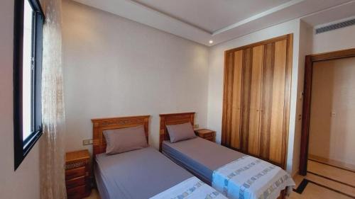 Oulad Khallouf Apartment | Tanger Apt Near Train & Mall