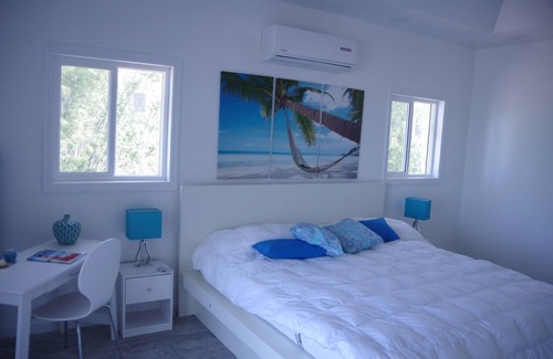 Tarpum Bay Villa | Tarpum Bay, Bahamas -NEW Luxury beachfront villa with private hot tub and beach
