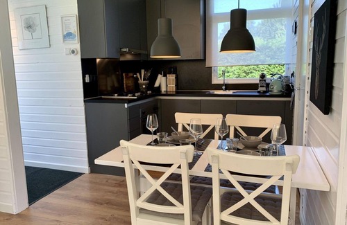 Sint Maartensvlotbrug House | Tastefully furnished, detached 4-person bungalow on a generous plot on the popular Eureka bungalow park near the beach, sea, dunes and woods. Free WiFi, washing machine.