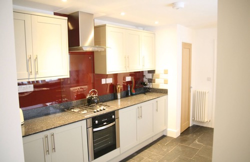 Tenby Apartment | Tastefully furnished basement apartment right by South Beach