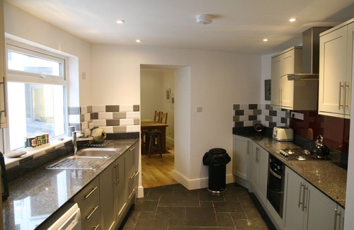 Tenby Apartment | Tastefully furnished basement apartment right by South Beach
