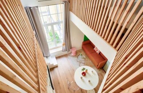 Quartier Saint-Ambroise Apartment | Temps suspendu - Sublime duplex avec mezzanine pour 4