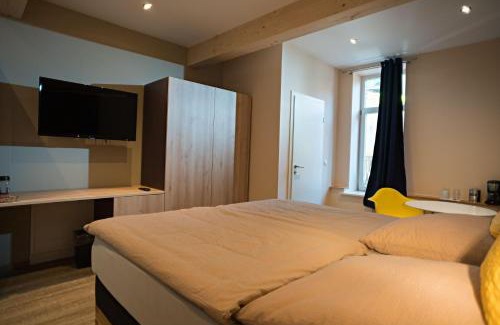 Marktheidenfeld Apartment | TENNENBODEN-Komfort-DZ-die-ehemalige-Tenne-in-der-Hofstallung