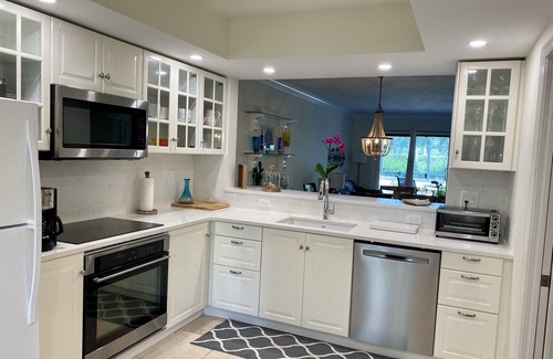 Pelican Bay House | Tennis Villa , beach access and amazing Pelican Bay amenities! 90 day minimum