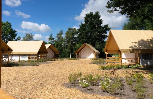 Mol RV Rental | Tent Lodge With Bathroom and Airco, Near a Lake