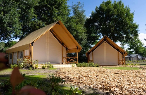 Mol RV Rental | Tent Lodge With Bathroom and Airco, Near a Lake
