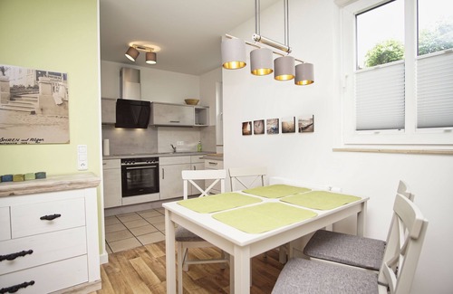 Gohren Apartment | Terrace, free use of the AHOI adventure pool and sauna - Villa Karola FeWo 02