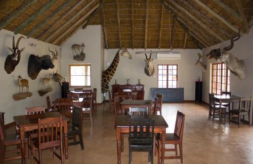 Madibeng Cabin | Thabaledi Game Lodge