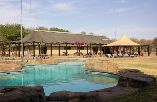 Madibeng Cabin | Thabaledi Game Lodge