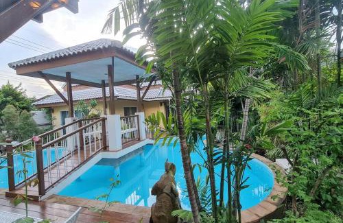 Nong Chom Villa | Thai Modern Villa with Salt Pool & Greenery Garden