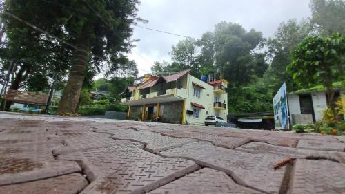 Naduvattam House | The Alpine Inn