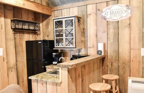 Branson Cabin | The Antler's Point Cabin is a private log cabin in the heart of Branson.