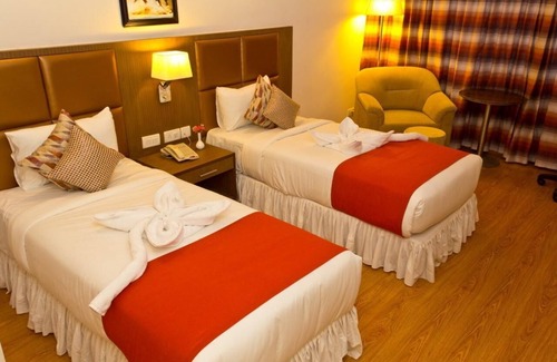 Mysore Hotel | The Atrium Boutique hotel with 1 bedroom and AC, WiFi in charming Mysore
