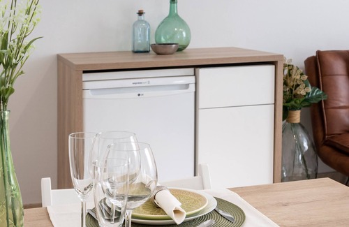 Centro - Sagrario Apartment | THE BALCONIES OF THE GRAN VIA: COMFORT IN THE HEART OF GRANADA
