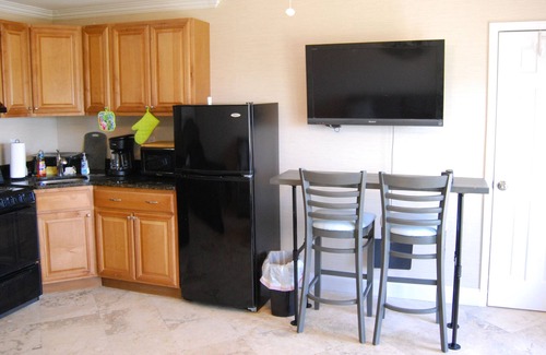Jacksonville Beach Condo | The Beach Den, Oceanfront poolside studio with kitchen and reserved parking