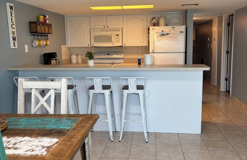 Indian Shores Condo | The beach is your backyard! Family size condo on Indian Shores! Sleeps 10!