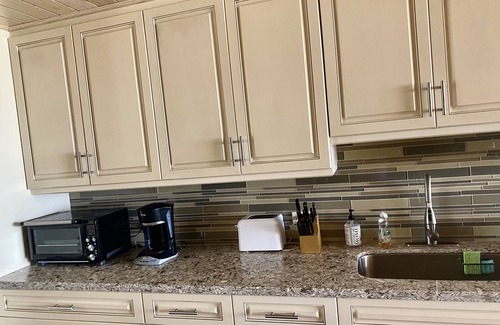 Estate Sion Farm Condo | THE BEST OF GENTLE WINDS. Luxurious unit overlooking the beach.