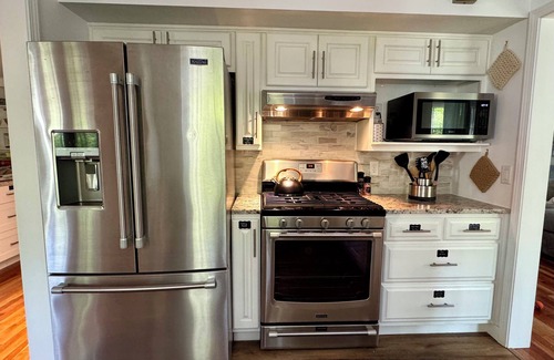 Bryan House | The Big Blue House – Spacious Bryan Retreat w/Game Room & Dog-Friendly Yard