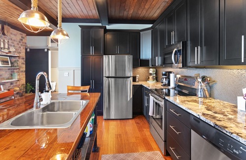 South Haven Condo | The Black Pearl: industrial condo sleeps 6, full size kitchen & scenic views!