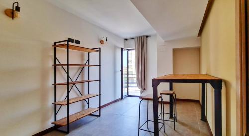 Bagheria Apartment | The blue and red rooms
