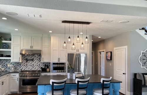 Tyler House | The Blue House on Two Lakes