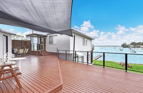 Sunshine House | The Boat House - Absolute Waterfront + Jetty