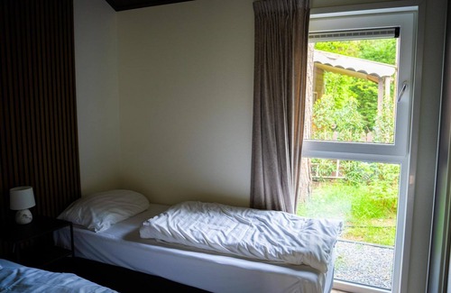 Rhenen House | The Boscottage, with hot tub for 4 people is located on forest edge of our park.