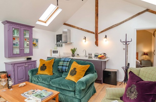 Saxmundham Cottage | THE BOTHY AT SNAPE HALL, pet friendly in Snape, Suffolk