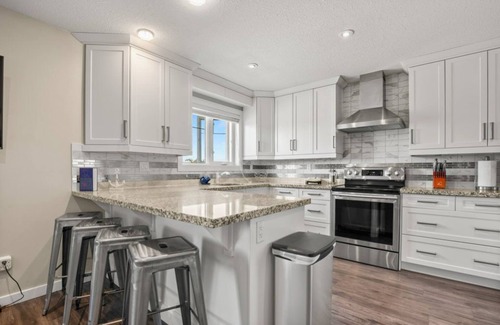 Sylvan Lake House | The Carriage House in Sylvan Lake~Private Patio~Sleeps 4 Adults/2 Children