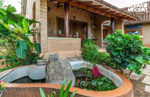 Doddaballapur Villa | The Clay Courtyard by VEO - Part of StayVista