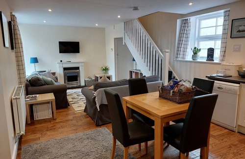 Canonbie Cottage | THE COACH HOUSE, CANONBIE, pet friendly, with a garden in Langholm