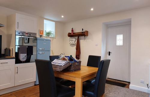 Canonbie Cottage | THE COACH HOUSE, CANONBIE, pet friendly, with a garden in Langholm