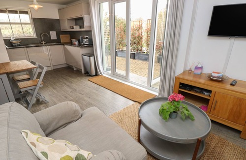 Brighstone Cottage | THE COACH HOUSE, pet friendly, with a garden in Brighstone