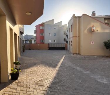 Rand Rifles Apartment | The Coastal Nest - 1 Min from the Beach