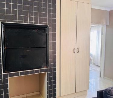 Rand Rifles Apartment | The Coastal Nest - 1 Min from the Beach