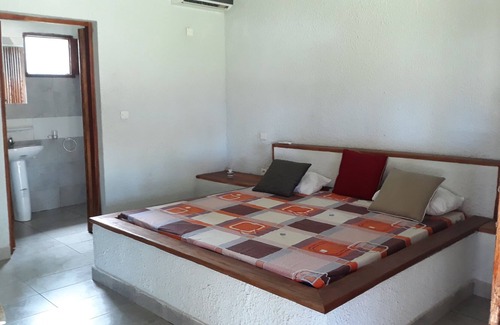 Assinie Ski Chalet | The coconut plantation of Assinie