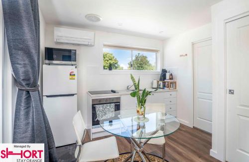 Orange Apartment | The Compact Cube - One-Bedroom Apartment on Summer