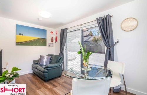 Orange Apartment | The Compact Cube - One-Bedroom Apartment on Summer