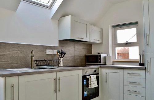 Strathcarron House | The Coolins cottage with wood burner