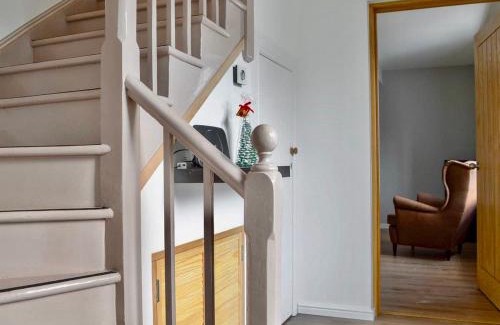 Strathcarron House | The Coolins cottage with wood burner