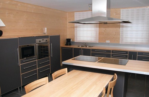 Noiseux House | The cottage is located between other houses in a dead end street in the village of Enneille.