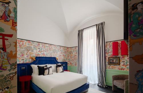Rione IV Campo Marzio Hotel | The Couper Condotti
