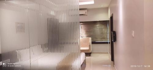 Shanthala Nagar Hotel | The Curzon Court