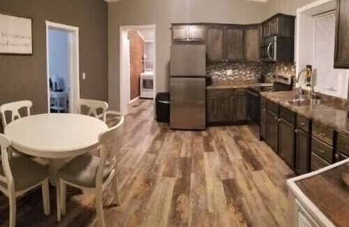 Guttenberg House | “The Depot” 2bedroom “3beds” 1 bath home. Outdoor party area with tv