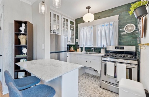 Golden Hill Apartment | The Downtown Carriage Flat