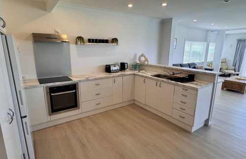 Papamoa Beach House | The Famous Blue Beachfront House - Papamoa Beach