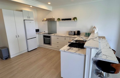 Papamoa Beach House | The Famous Blue Beachfront House - Papamoa Beach